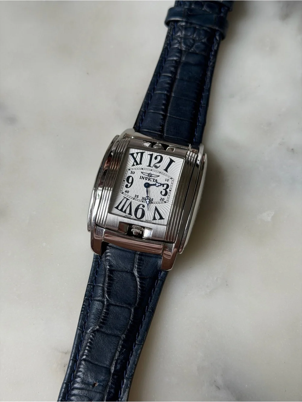 Invicta Men's Silver Case Flip Face Watch  with Dark Blue Leather Strap